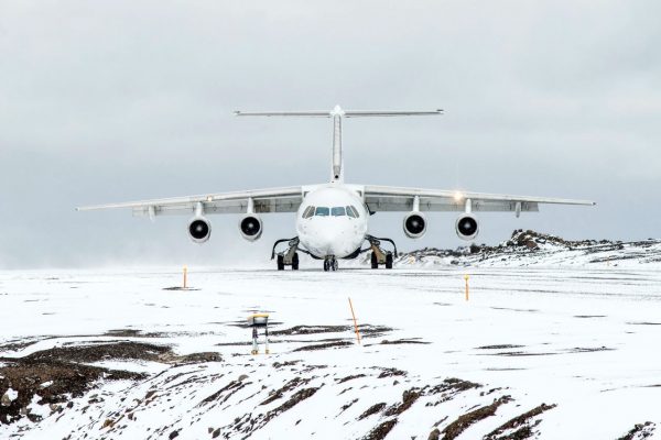 A plane lands on the runway of King George Island in Antarctica